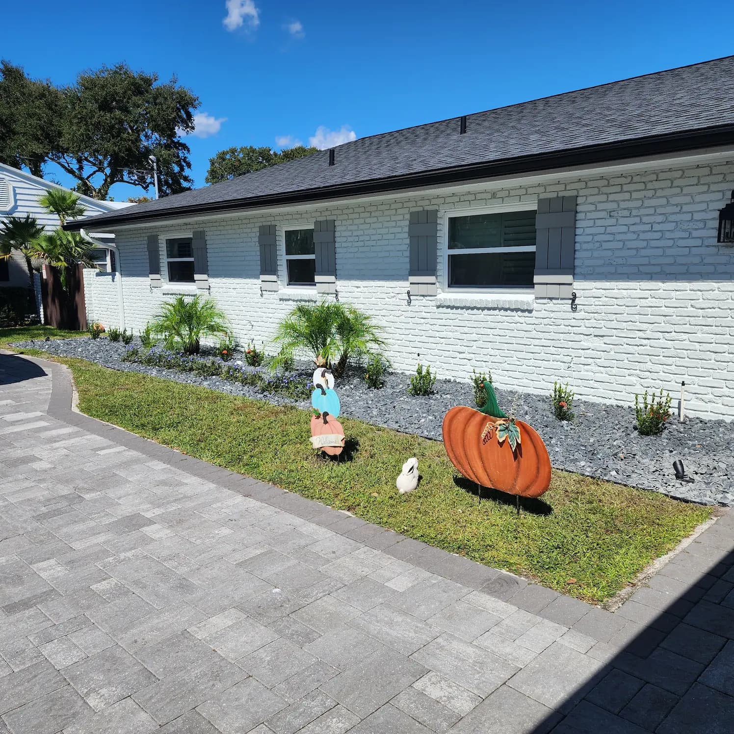 Custom paver patio with outdoor living space