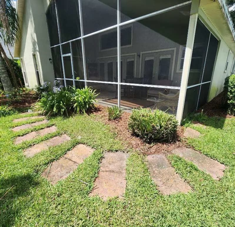 Before and after of a cleaned-up residential lawn