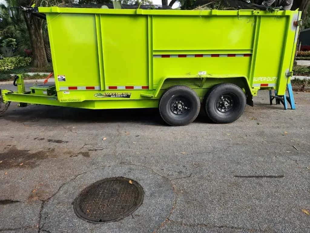Dump trailer parked in residential driveway